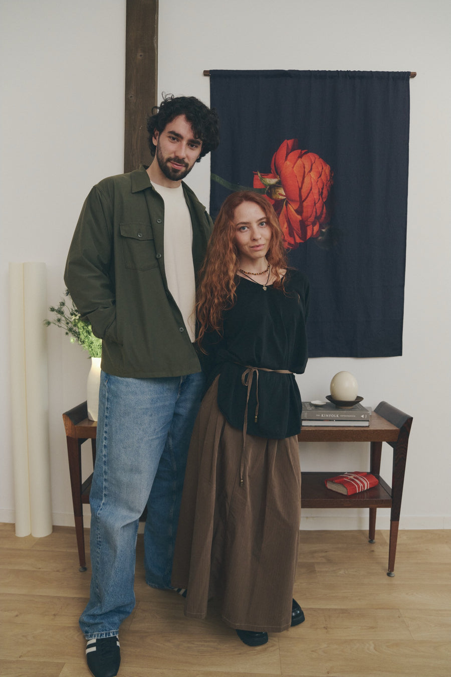 Two people behind every image.